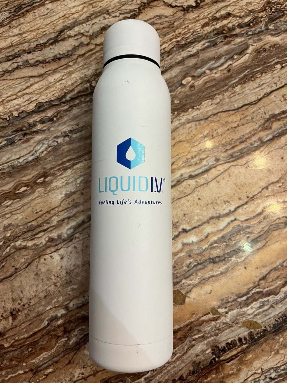 Liquid IV white reusable water bottle
